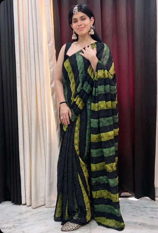 black and green sequin saree